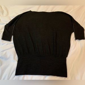 Black sweater with zipper on sleeves by Mosquitos